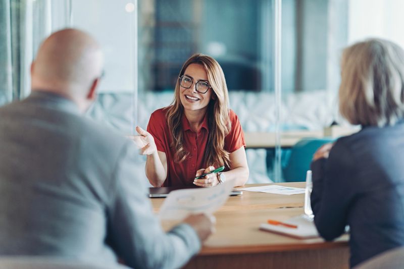 Focus on a young businesswoman during a meeting