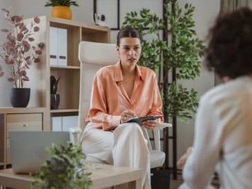 Therapist Lisa in a welcoming setting.