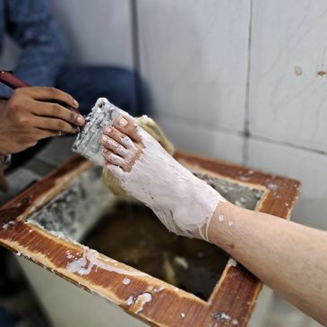 A leg of women cleaning after painting