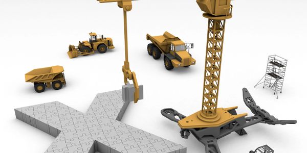 Construction vehicles assembling a large puzzle piece shaped like an 'X'.