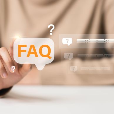 Person interacting with a digital FAQ interface with question marks.