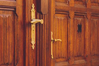 A neglected front door.
Water-damaged plaster.
Beautiful timber.
Original architectural details.

