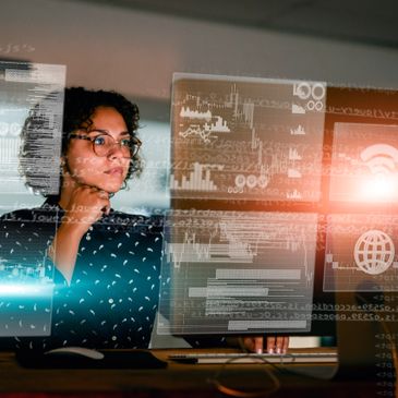 A woman analyzing data of the modules assetli provides.