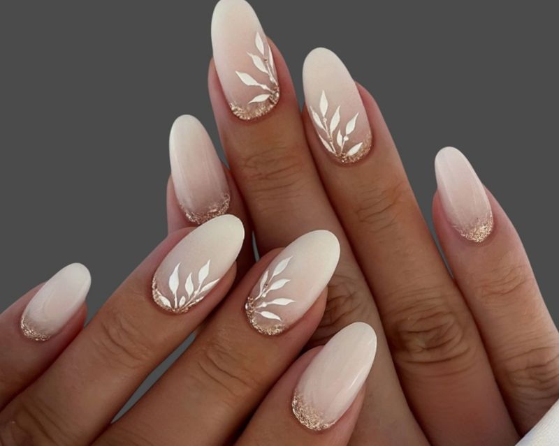 Close-up of a woman’s hands showcasing a professional manicure with perfectly shaped nails and glossy polish in a fashionable color. The nail art features intricate and stylish designs that add a touch of sophistication and glamour. Ideal for beauty salons, nail care promotions, cosmetics advertising, fashion editorials, spa treatments, and self-care concepts. The image highlights smooth skin, neat cuticles, and the artistry of modern nail design, making it perfect for marketing campaigns in the beauty and fashion industry