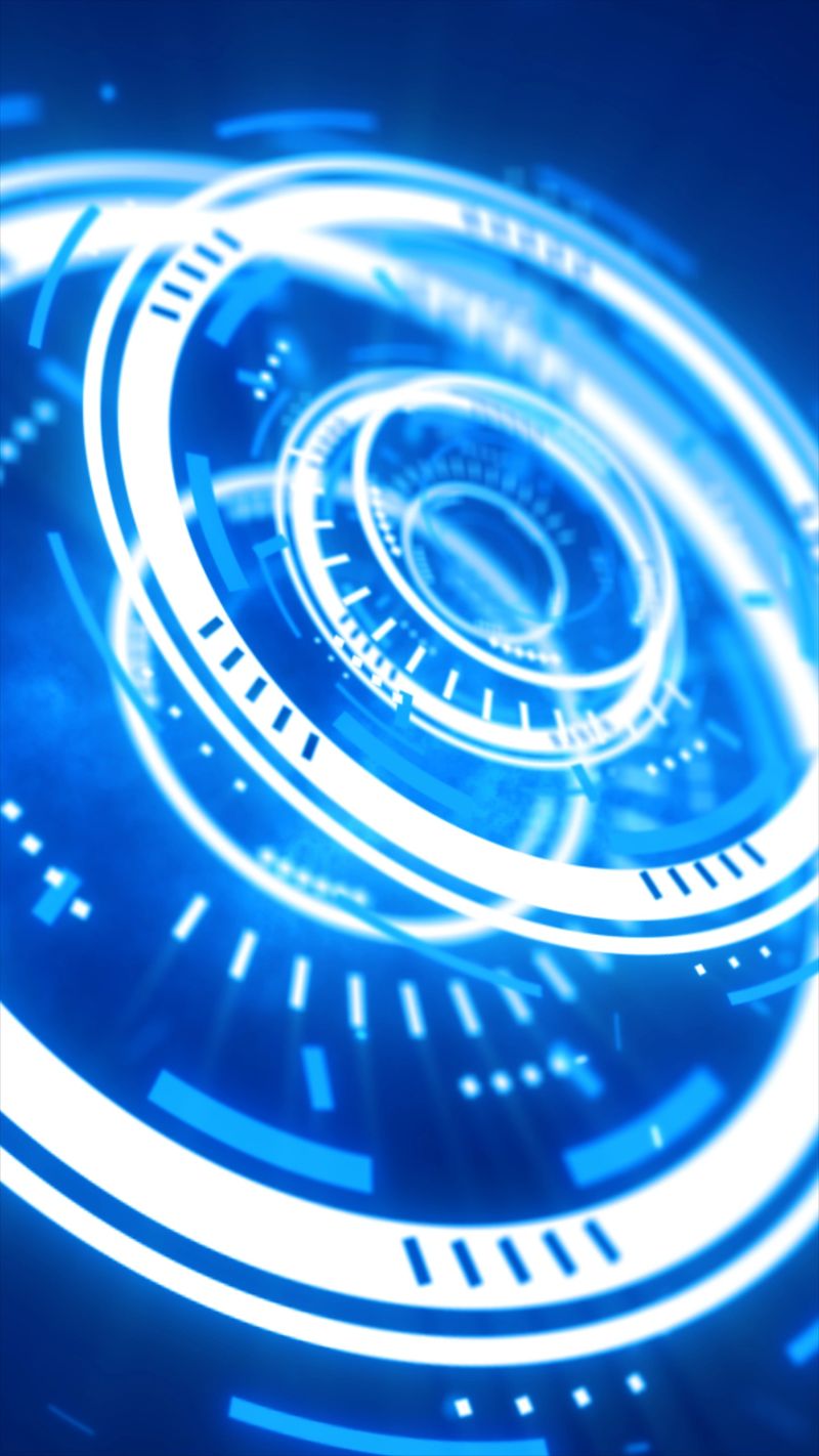Futuristic blue digital interface composed of rotating circular elements, gauges, and HUD-style highlights glowing in perspective.