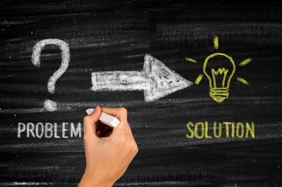 The arrow moving from problem to solution represents solution-focused therapy