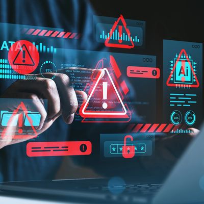 Hacker interacting with digital security warnings.