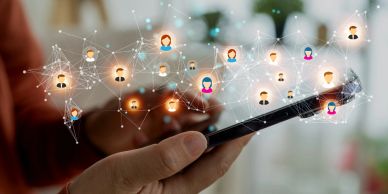 Person interacting with social network on a smartphone.