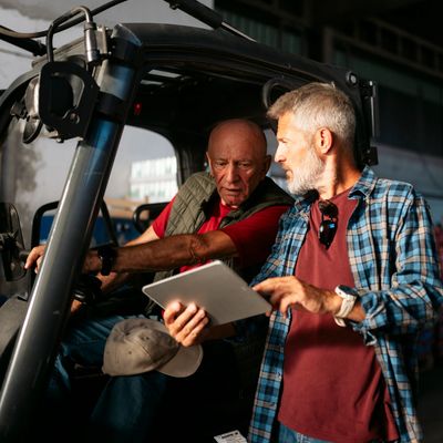 Supervisors reviewing jobsite policies. Industrial HR documentation and compliance in BC.