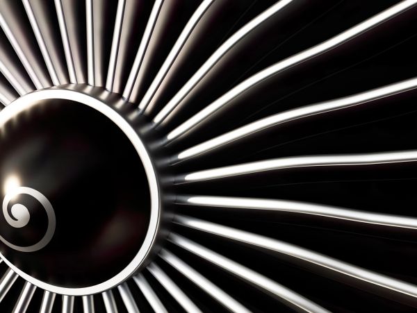 Close-up of turbine fan blades with spiral center.