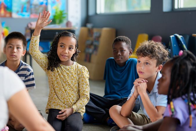 Children engaging in diverse classroom activities.