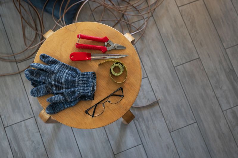 Necessary tools for weaving a rattan basket, top view, gloves, centimeter, knife, and nippers. Decoration.