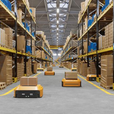 Autonomous robots transporting packages in a modern warehouse.