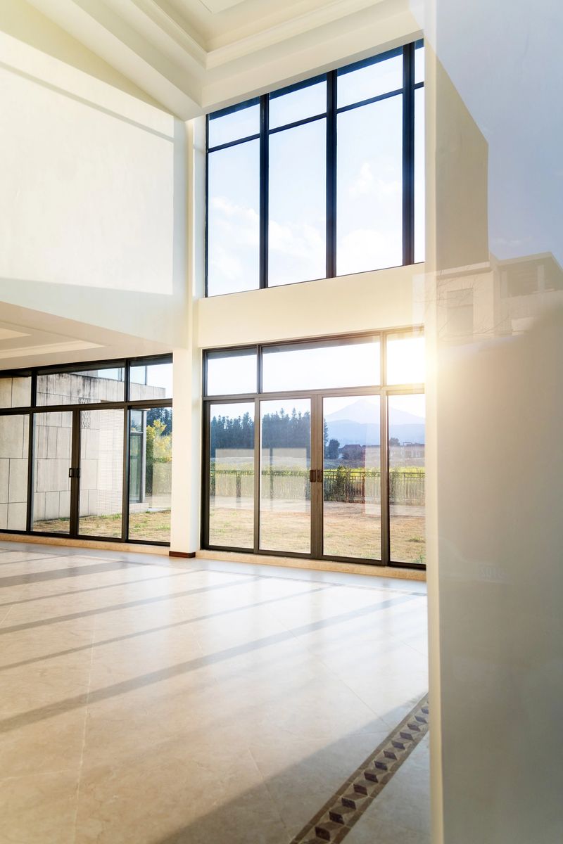 Empty modern living room with big window