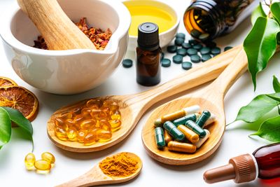 Various herbal supplements and capsules with natural ingredients.