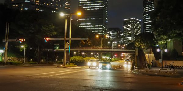 Cars driving on the road at night