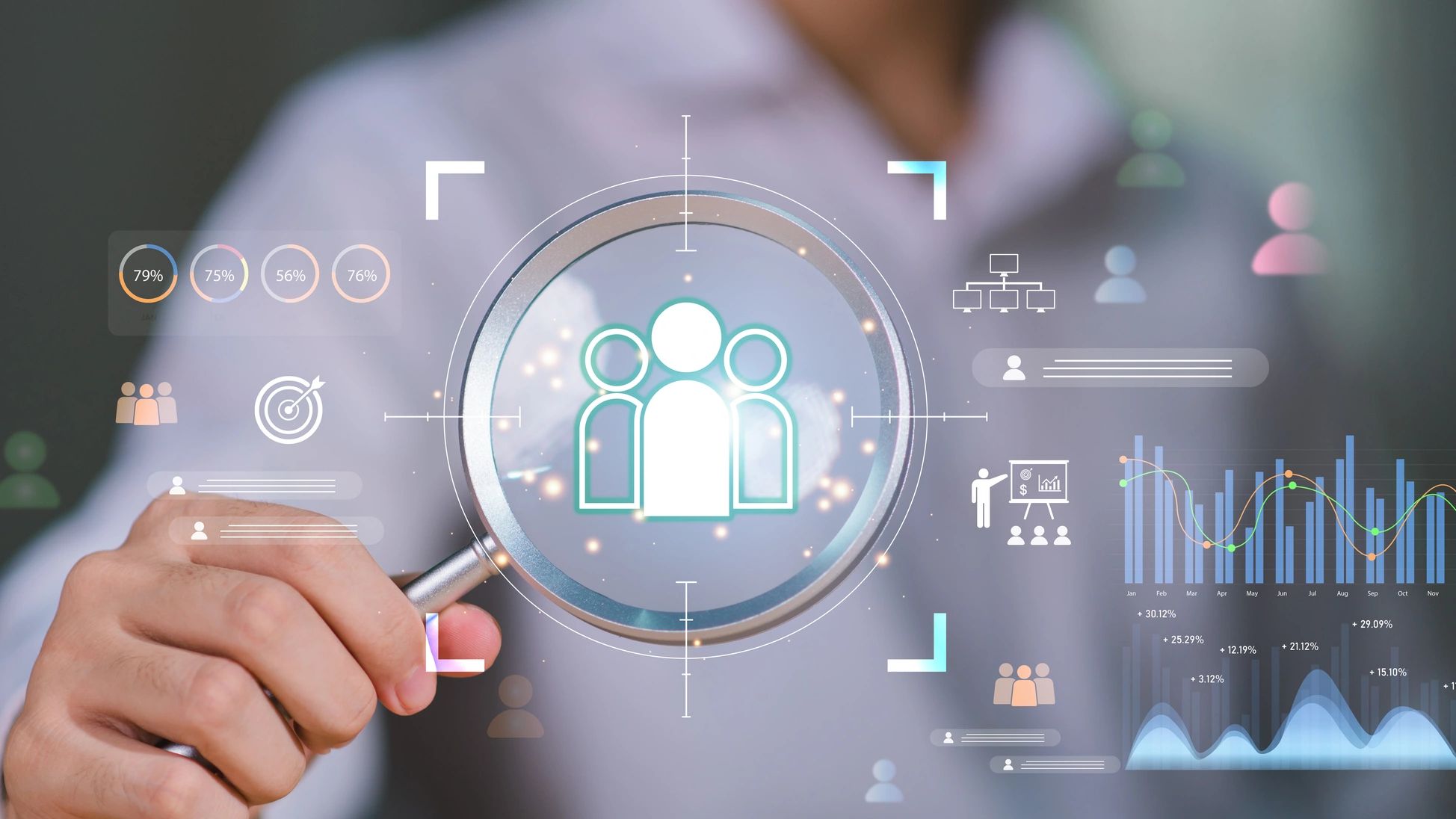 Magnifying glass focusing on team and business icons.