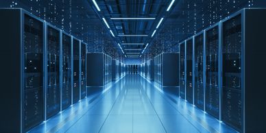 A futuristic data center corridor with server racks and blue lighting.