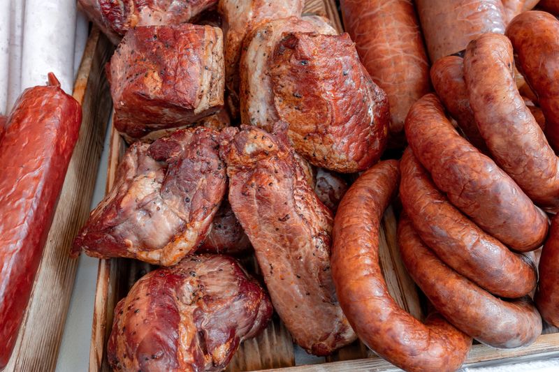Assortment of smoked meats and sausages, ready for consumption