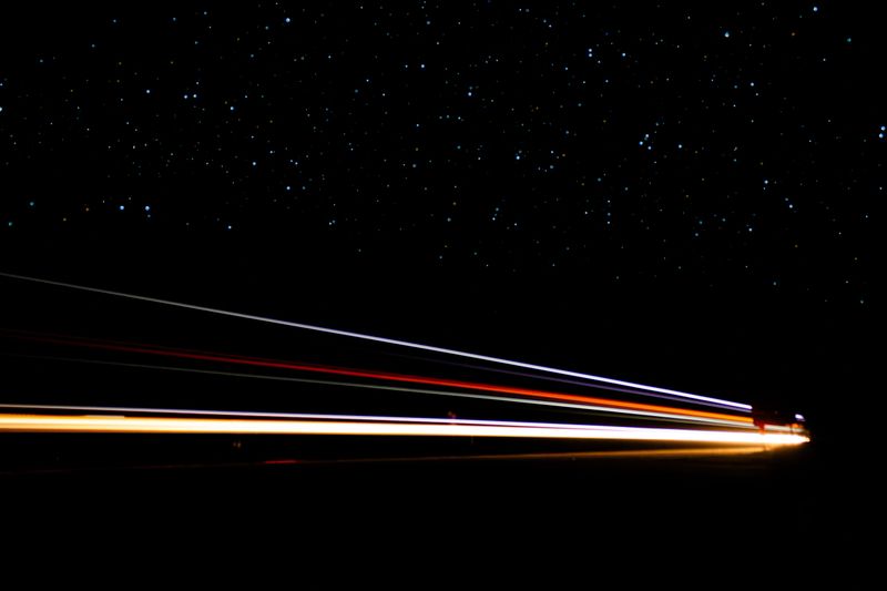 This photography series showcases the power and beauty of Australian road trains captured at night through the art of light painting and long exposure in Byron Bay. Using truck headlights, neon trails, and highway light beams, these images transform motion into luminous waves and abstract shapes against the backdrop of the Australian night sky filled with stars. Each photograph is a fusion of landscape, technology, and creative photography, turning everyday truck traffic into stunning visual art. Perfect for modern wall decor, interior design, and fine art prints, these works also serve as unique graphic resources for digital projects, album covers, branding, or editorial use. With their vibrant energy and surreal aesthetic, the images highlight the connection between speed, movement, and the natural environment, offering both collectors and designers authentic Australian photography with a contemporary artistic vision.