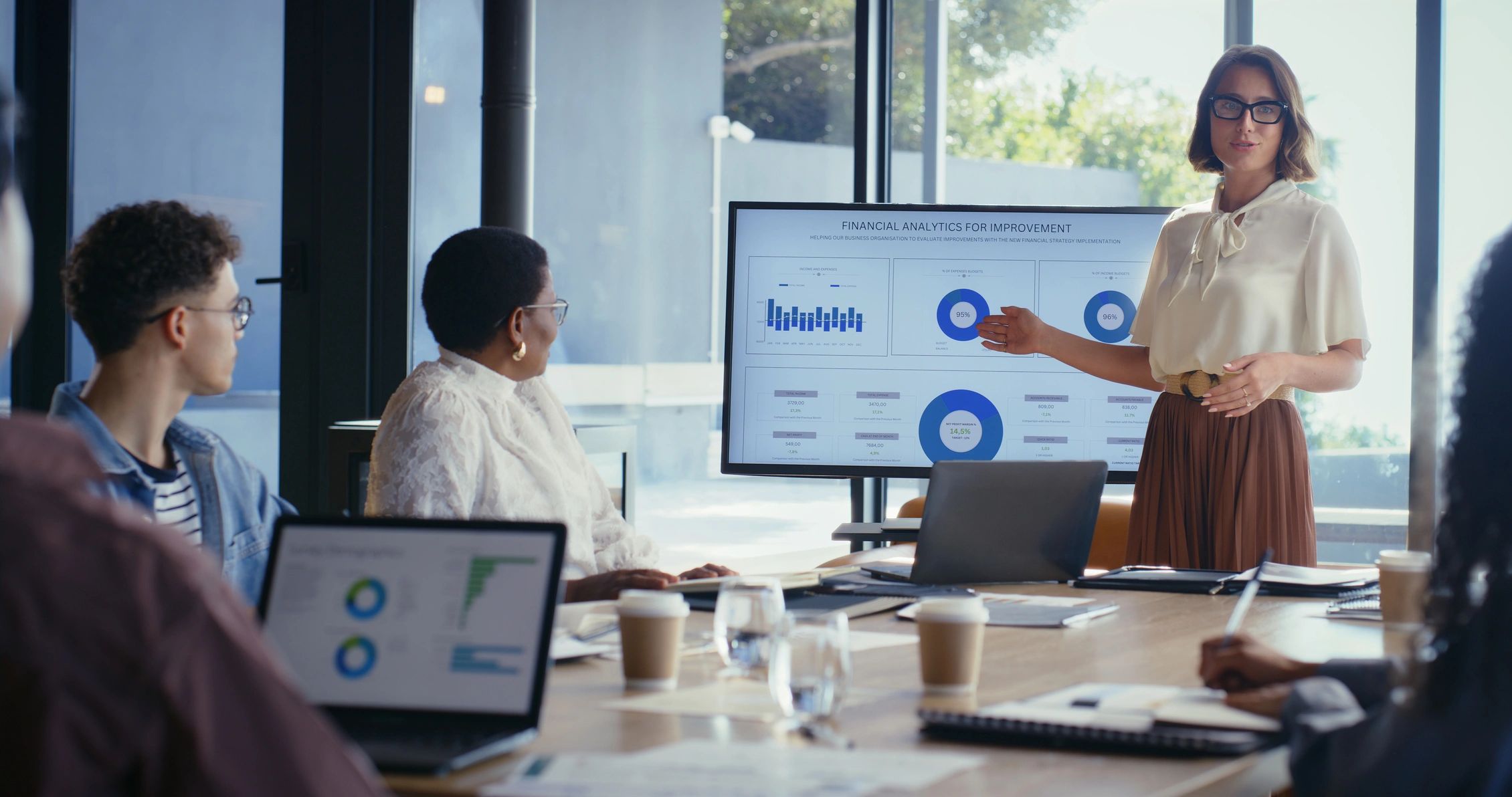 Colleagues discussing a business presentation.