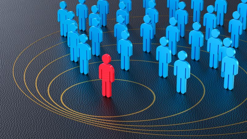 This 3D illustration shows a central red figure at the core of several concentric circles, with a larger blue group positioned outside these rings. This is a powerful visual metaphor for Leadership, Influence, and reaching a Target Market. The red figure represents a leader, influencer, or brand, and the golden circles symbolize their sphere of Connection and Communication. It is an ideal graphic for presentations on Marketing Strategy, Customer Engagement, Corporate Culture, and the concept of Social Distancing or influence zones.