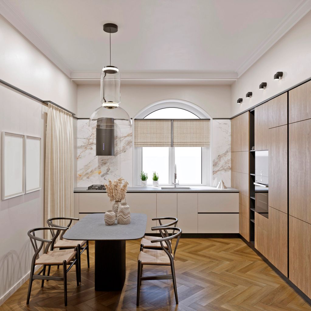 Modern kitchen with wood accents and a minimal dining table.