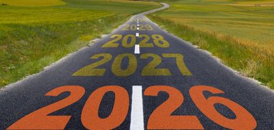 A road with years 2026 to 2029 painted on it.