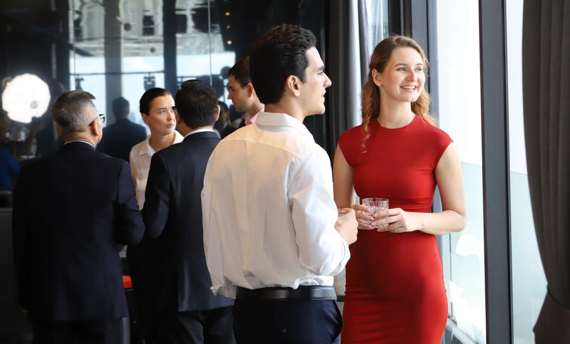 Businesspeople in a meeting and celebration at club