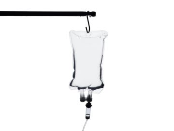 An empty or near-empty IV fluid bag hanging from a stand.