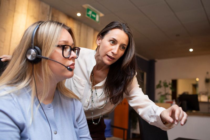 Female manager working with a younger female colleague