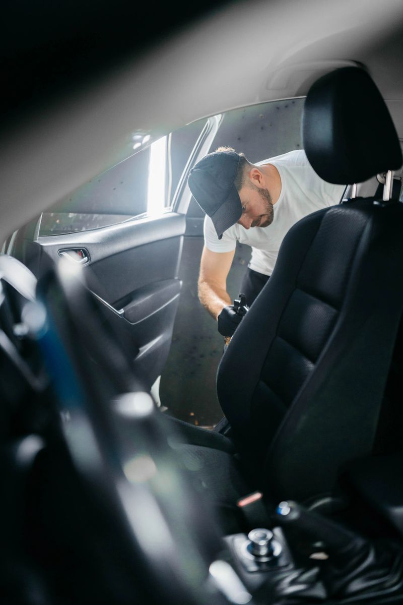 Car interior detailing, cleaning and vacuuming.