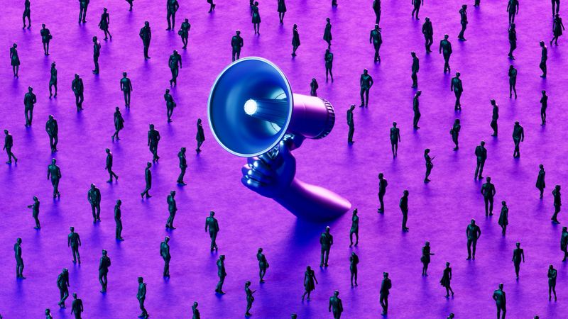 A digitally generated image showcasing a glowing megaphone positioned among a crowd of businesspeople, all set against a futuristic neon-lit background. The vibrant scene represents themes of communication, leadership, corporate messaging, and digital influence. Ideal for illustrating business strategy, marketing, announcements, and workplace dynamics in a modern, tech-driven context.