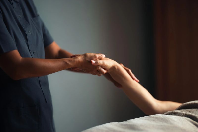 A professional therapist providing a soothing hand massage, promoting relaxation and comfort in a serene spa environment. Ideal symbol of wellness, care, and peaceful self-care experiences.