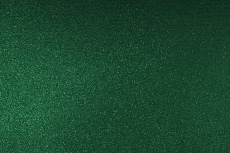 Abstract shiny, radiant texture background with different shades of dark green color. Painted canvas, glitter concrete surface, studio backdrop, grainy textured effect
