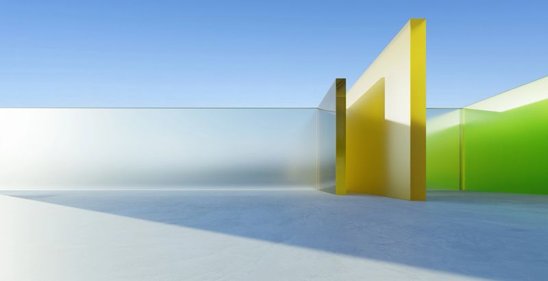Abstract architectural composition featuring colorful glass walls and panels, creating a modern and minimalist aesthetic under a clear blue sky. 3d rendering
