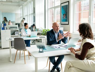 Business meeting in a modern office.