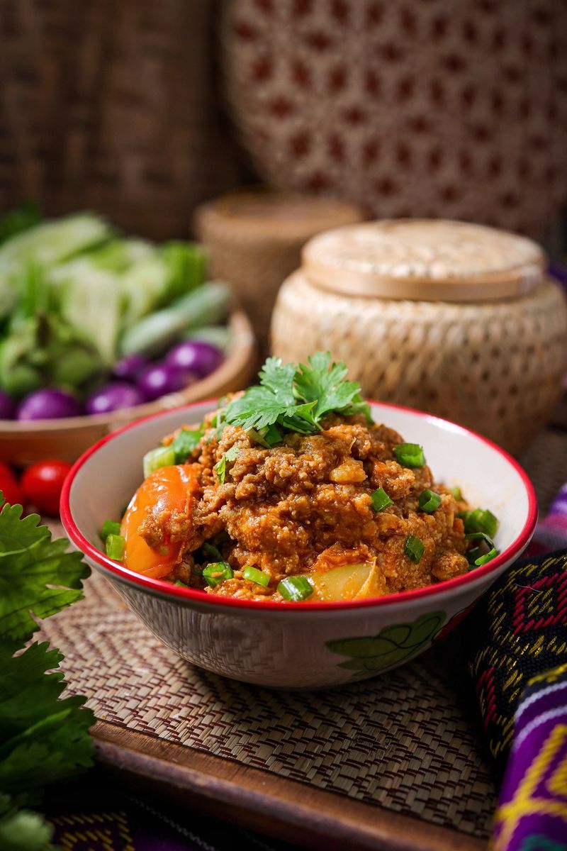 Spicy Northern Thai Pork with Tomato,Northern thai chilli dip,thai called Nam prik ong , lanna cuisine, northern thai food