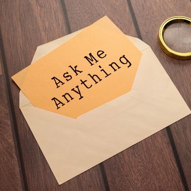 Envelope with "Ask Me Anything" card inside.
