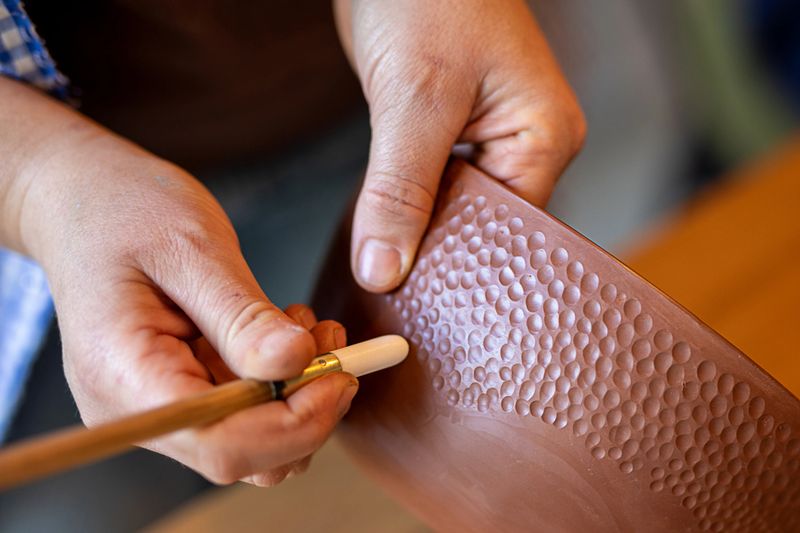 Close-up of clay work during a women´s pottery workshop - Buenos Aires - Argentina