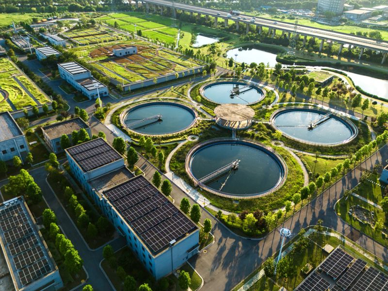 Wastewater treatment plant with solar panels in the city