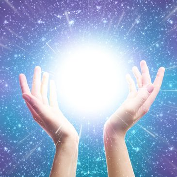 Two hands holding a glowing orb in a starry cosmic background.