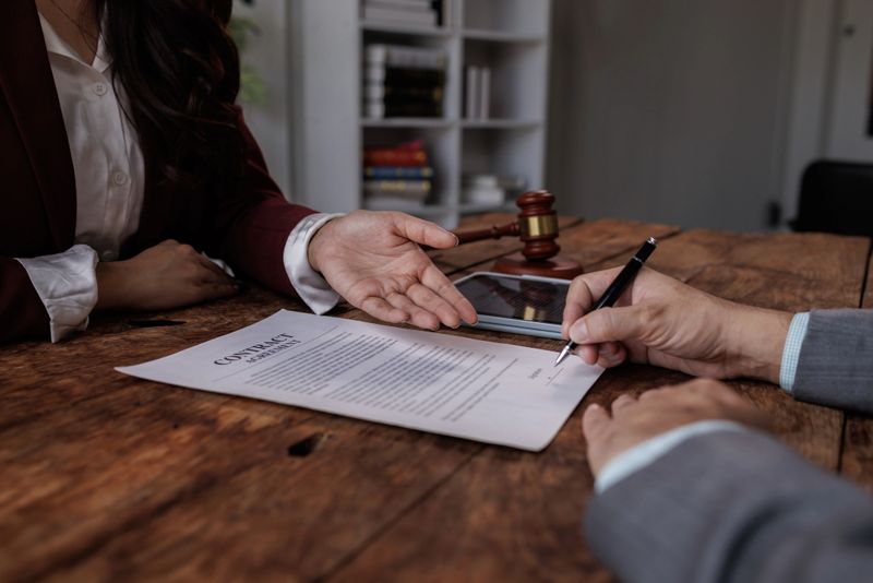 Notary with client in office,Judge gavel with Justice lawyers lawyer or judge counselor having team meeting with client, Law and Legal services concept.