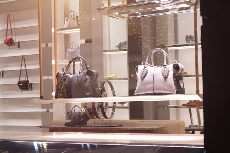 Boutique showcase with fashionable women's bags and accessories. Luxury goods