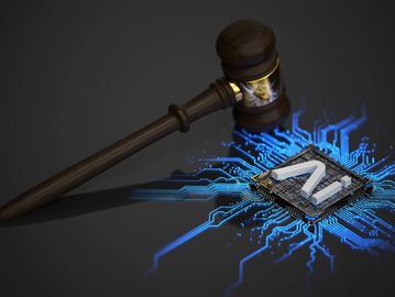 Gavel striking a glowing microchip with the letter N.