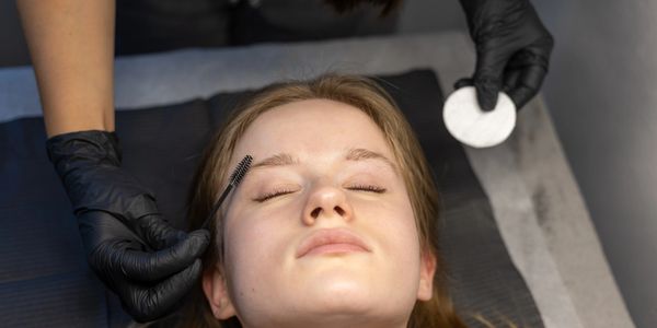Marysville woman receiving brow lamination and lash lift in a single appointment at Autumn Noel Esth