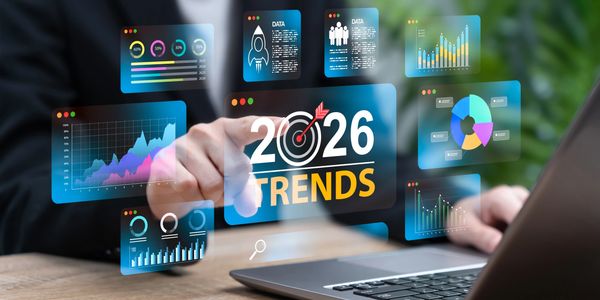 Person interacting with futuristic data and 2026 trends.
