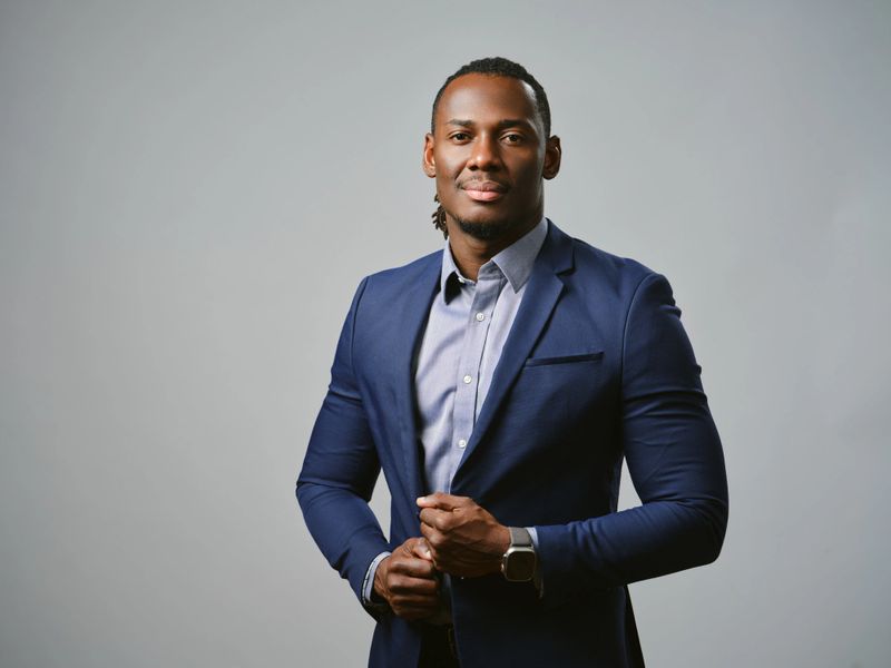 Studio portrait headshots of a black man.
