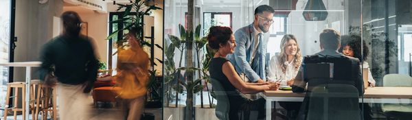 Team having a meeting in a bright office.