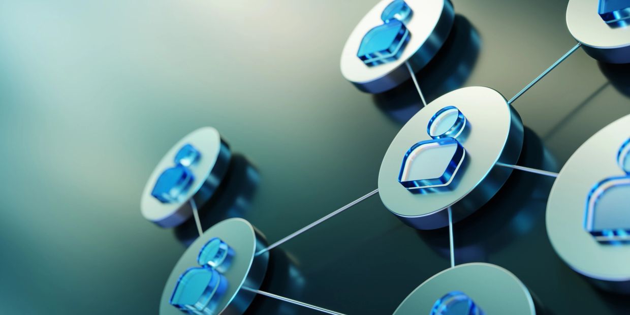 3D blue user icons connected in a network.